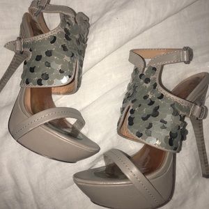 Super sexy and unique L.A.M.B heels!